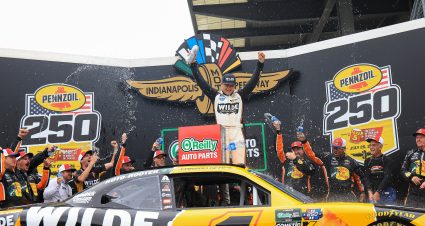 INDIANAPOLIS, INDIANA - JULY 25: Carson Kvapil, driver of the #1 Wilde Protein Crackers Chevrolet, celebrates in victory lane after winning the NASCAR O'Reilly Auto Parts Series Pennzoil 250 Presented by Take 5 Oil Change at Indianapolis Motor Speedway on July 25, 2026 in Indianapolis, Indiana. (Photo by Justin Casterline/Getty Images) | Getty Images