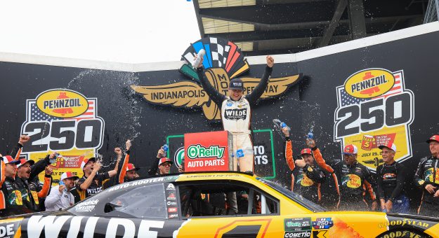 INDIANAPOLIS, INDIANA - JULY 25: Carson Kvapil, driver of the #1 Wilde Protein Crackers Chevrolet, celebrates in victory lane after winning the NASCAR O'Reilly Auto Parts Series Pennzoil 250 Presented by Take 5 Oil Change at Indianapolis Motor Speedway on July 25, 2026 in Indianapolis, Indiana. (Photo by Justin Casterline/Getty Images) | Getty Images