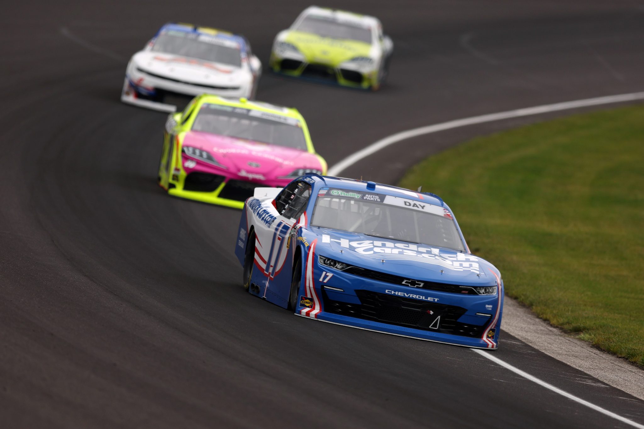 INDIANAPOLIS, INDIANA - JULY 25: Corey Day, driver of the #17 HendrickCars.com Chevrolet, drives during the NASCAR O'Reilly Auto Parts Series Pennzoil 250 Presented by Take 5 Oil Change at Indianapolis Motor Speedway on July 25, 2026 in Indianapolis, Indiana. (Photo by Logan Riely/Getty Images) | Getty Images