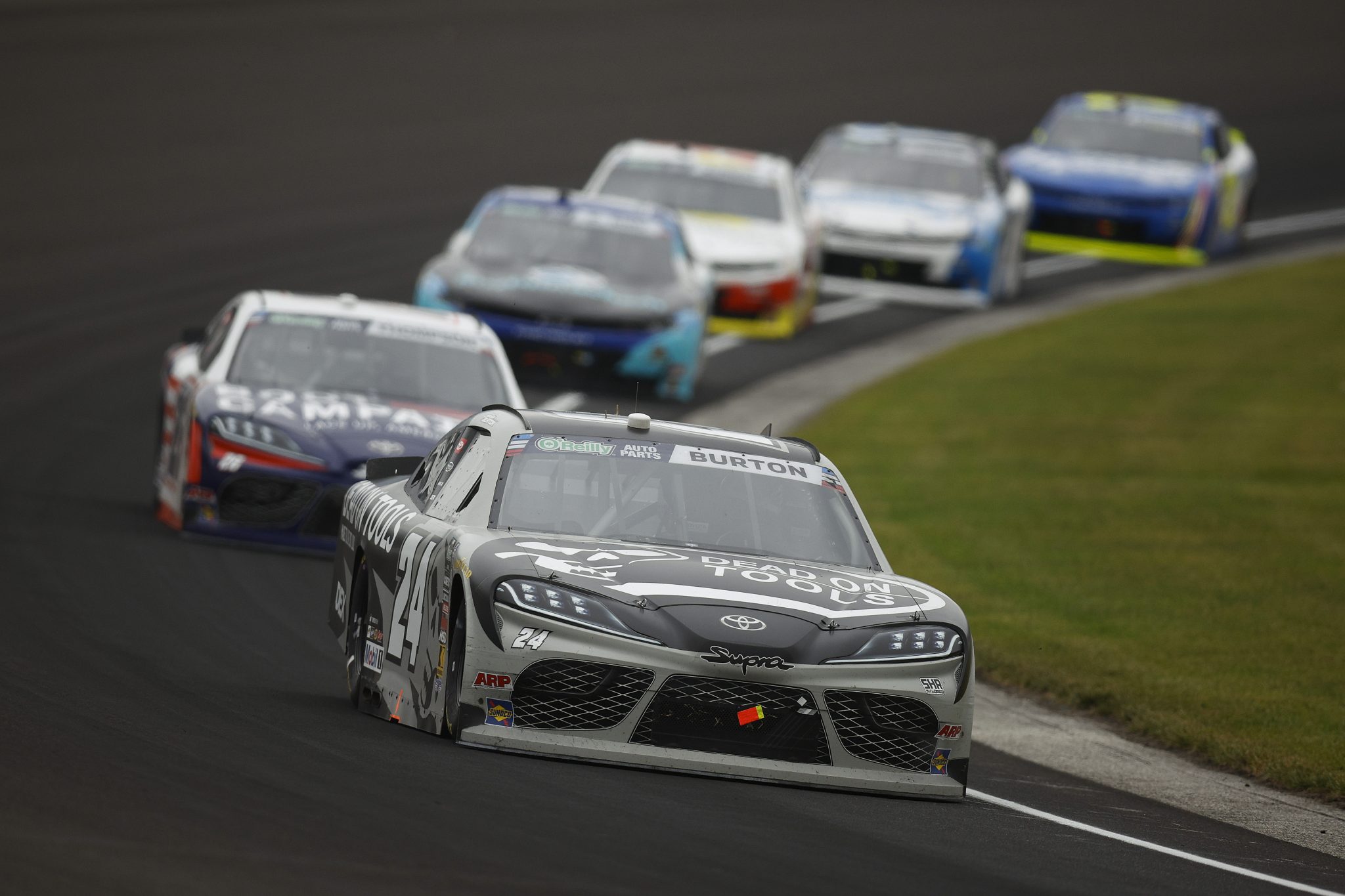 INDIANAPOLIS, INDIANA - JULY 25: Harrison Burton, driver of the #24 Dead On Tools Toyota, drives during the NASCAR O'Reilly Auto Parts Series Pennzoil 250 Presented by Take 5 Oil Change at Indianapolis Motor Speedway on July 25, 2026 in Indianapolis, Indiana. (Photo by Sean Gardner/Getty Images) | Getty Images