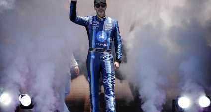 SAN DIEGO, CALIFORNIA - JUNE 21: Jimmie Johnson, driver of the #84 Carvana Toyota, waves to fans as he walks onstage during driver intros prior to the NASCAR Cup Series Anduril 250 at Naval Base Coronado on June 21, 2026 in San Diego, California. (Photo by Sean Gardner/Getty Images) | Getty Images