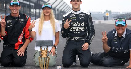 INDIANAPOLIS, INDIANA - JULY 26: Corey Heim, driver of the #67 Field & Stream Toyota, (C) Taylor Reimer (L) and crew chief Robert 