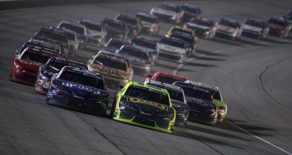 JOLIET, ILLINOIS - JULY 04: Brandon Jones, driver of the #20 Menards/MD Building Products Toyota, and Taylor Gray, driver of the #54 Operation 300 Toyota, lead the field during the NASCAR O'Reilly Auto Parts Series Cuervo 300 at Chicagoland Speedway on July 04, 2026 in Joliet, Illinois. (Photo by James Gilbert/Getty Images) | Getty Images