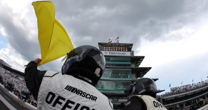 INDIANAPOLIS, INDIANA - JULY 27: A NASCAR Official waves the yellow caution flag during the NASCAR Cup Series Brickyard 400 Presented by PPG at Indianapolis Motor Speedway on July 27, 2025 in Indianapolis, Indiana. (Photo by Jonathan Bachman/Getty Images) | Getty Images
