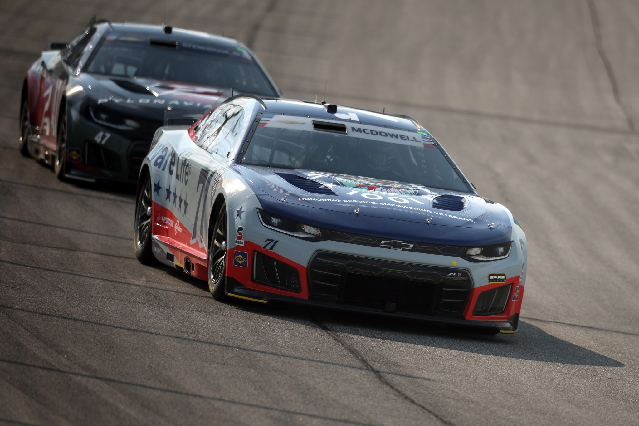 JOLIET, ILLINOIS - JULY 03: Michael McDowell, driver of the #71 Veterans 1001/Delaware Life Chevrolet, and Ricky Stenhouse Jr., driver of the #47 Pylon Aviation Chevrolet, drive during practice for the NASCAR Cup Series eero 400 at Chicagoland Speedway on July 03, 2026 in Joliet, Illinois. (Photo by James Gilbert/Getty Images) | Getty Images