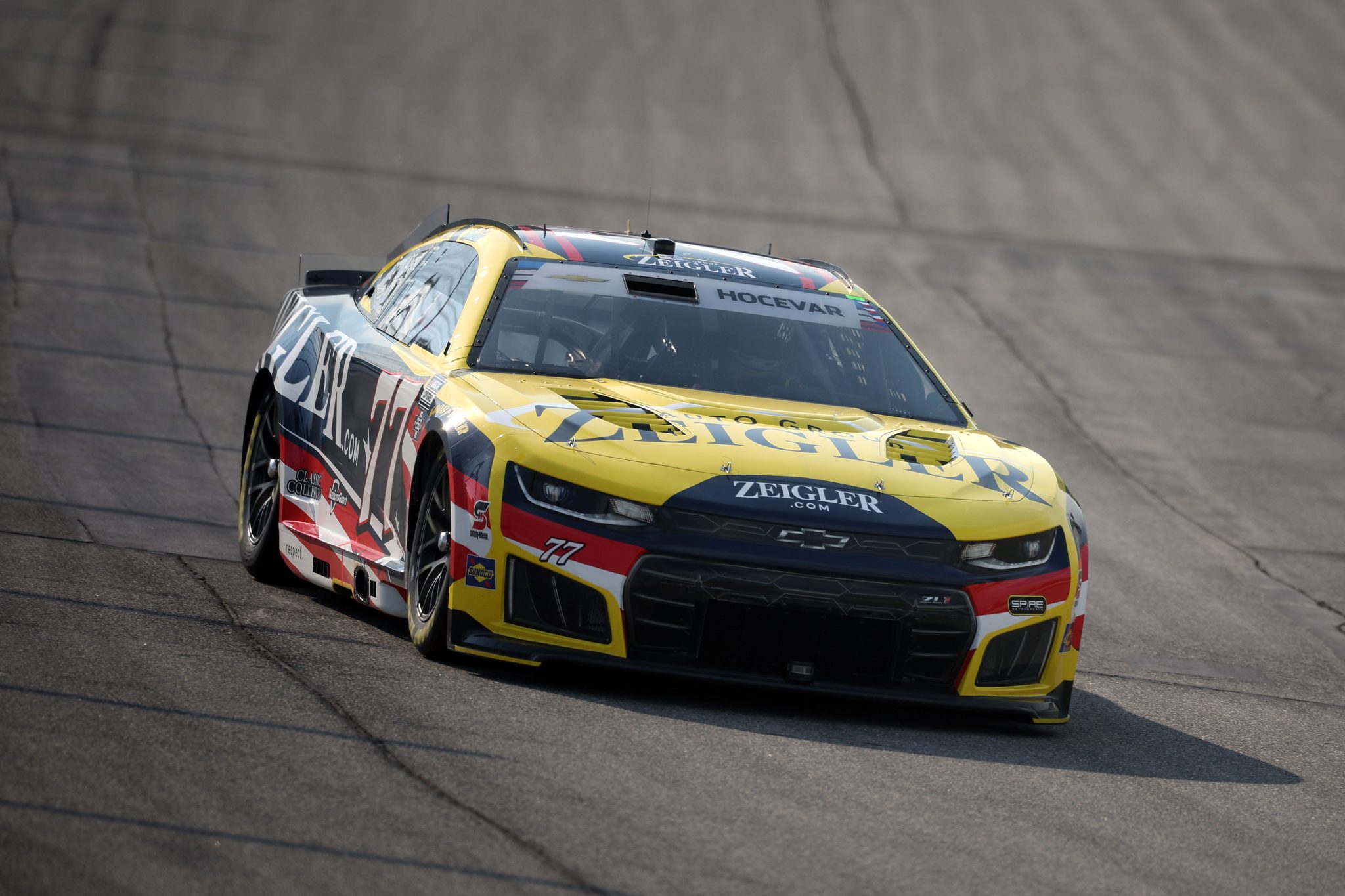 JOLIET, ILLINOIS - JULY 03: Carson Hocevar, driver of the #77 Zeigler Auto Group Chevrolet, drives during practice for the NASCAR Cup Series eero 400 at Chicagoland Speedway on July 03, 2026 in Joliet, Illinois. (Photo by James Gilbert/Getty Images) | Getty Images