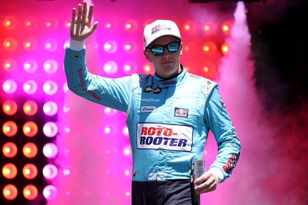 SONOMA, CALIFORNIA - JUNE 27: Connor Zilisch, driver of the #1 Roto-Rooter Chevrolet, waves to fans as he walks onstage during driver intros prior to the NASCAR O'Reilly Auto Parts Series Pit Boss/FoodMaxx 250 at Sonoma Raceway on June 27, 2026 in Sonoma, California. (Photo by James Gilbert/Getty Images) | Getty Images