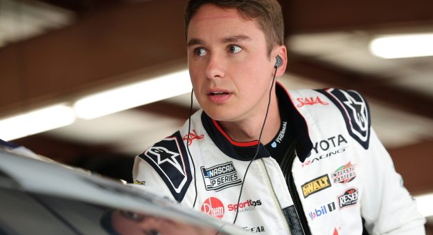 JOLIET, ILLINOIS - JULY 03: Christopher Bell, driver of the #20 SAIA Freight + Logistics Toyota, looks on in the garage area during practice for the NASCAR Cup Series eero 400 at Chicagoland Speedway on July 03, 2026 in Joliet, Illinois. (Photo by Jonathan Bachman/Getty Images) | Getty Images