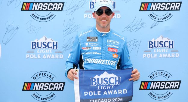 JOLIET, ILLINOIS - JULY 04: Denny Hamlin, driver of the #11 Progressive Insurance Toyota, poses for photos after winning the pole award during qualifying for the NASCAR Cup Series eero 400 at Chicagoland Speedway on July 04, 2026 in Joliet, Illinois. (Photo by Jonathan Bachman/Getty Images) | Getty Images