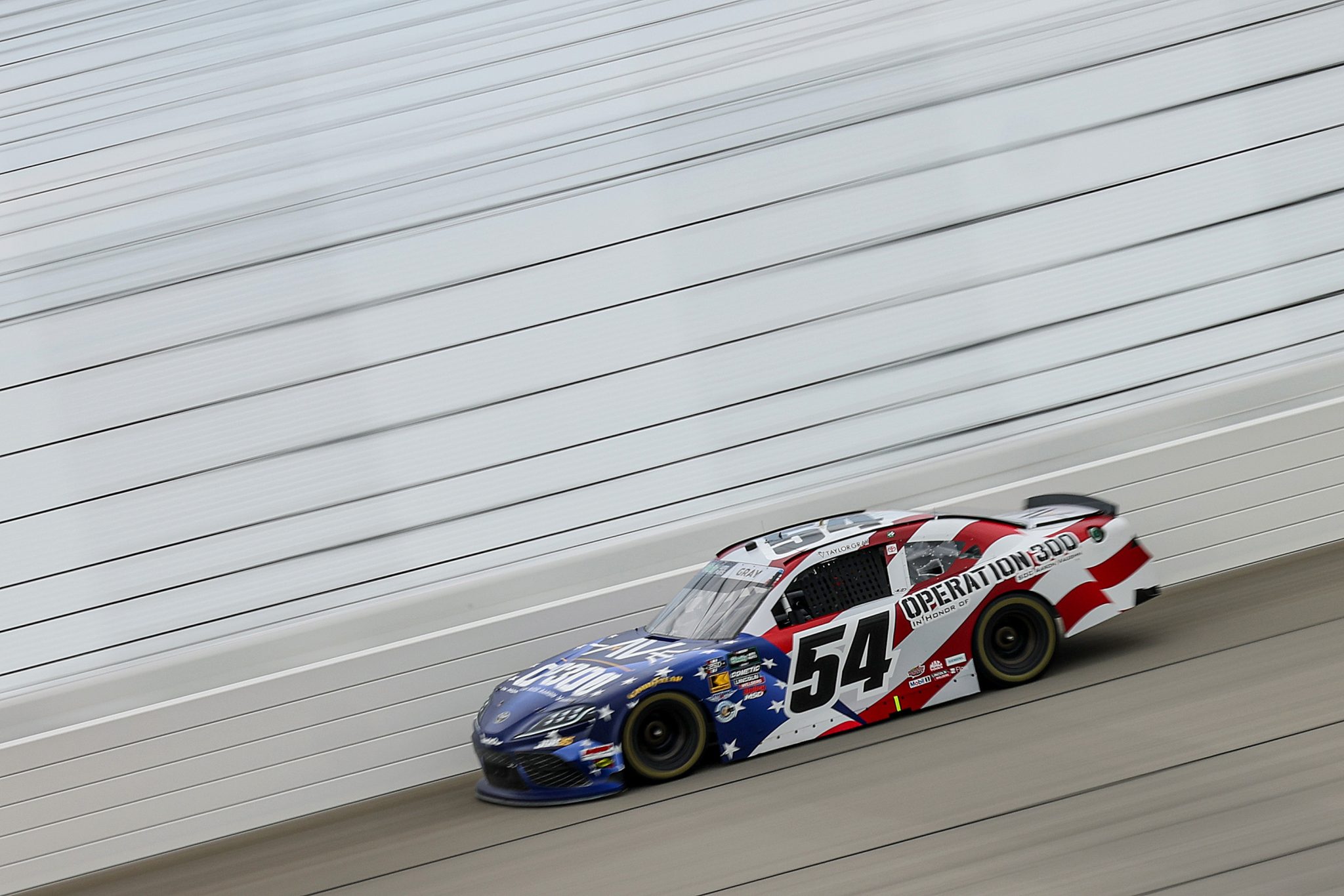 JOLIET, ILLINOIS - JULY 04: Taylor Gray, driver of the #54 Operation 300 Toyota, drives during practice for the NASCAR O'Reilly Auto Parts Series Cuervo 300 at Chicagoland Speedway on July 04, 2026 in Joliet, Illinois. (Photo by James Gilbert/Getty Images) | Getty Images