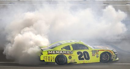 JOLIET, ILLINOIS - JULY 04: Brandon Jones, driver of the #20 Menards/MD Building Products Toyota, celebrates with a burnout after winning the NASCAR O'Reilly Auto Parts Series Cuervo 300 at Chicagoland Speedway on July 04, 2026 in Joliet, Illinois. (Photo by Jonathan Bachman/Getty Images) | Getty Images