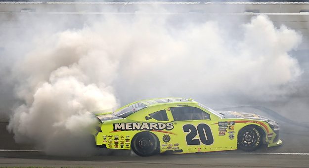 JOLIET, ILLINOIS - JULY 04: Brandon Jones, driver of the #20 Menards/MD Building Products Toyota, celebrates with a burnout after winning the NASCAR O'Reilly Auto Parts Series Cuervo 300 at Chicagoland Speedway on July 04, 2026 in Joliet, Illinois. (Photo by Jonathan Bachman/Getty Images) | Getty Images