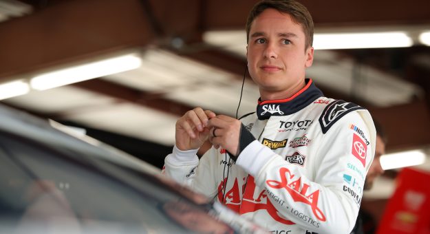 JOLIET, ILLINOIS - JULY 03: Christopher Bell, driver of the #20 SAIA Freight + Logistics Toyota, looks on in the garage area during practice for the NASCAR Cup Series eero 400 at Chicagoland Speedway on July 03, 2026 in Joliet, Illinois. (Photo by Jonathan Bachman/Getty Images) | Getty Images