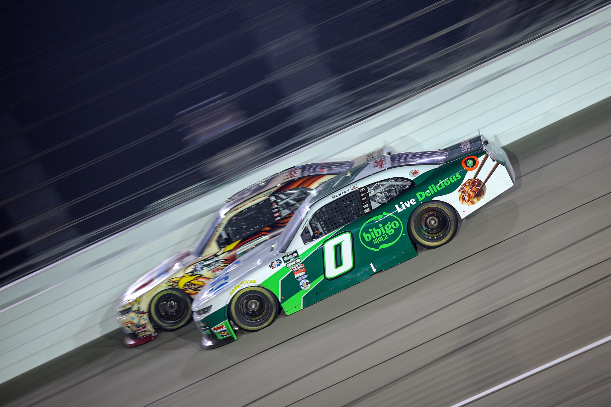 JOLIET, ILLINOIS - JULY 04: Cole Custer, driver of the #0 Sysco Chevrolet, and Carson Kvapil, driver of the #9 Arby's Cheesesteak Chevrolet, race during the NASCAR O'Reilly Auto Parts Series Cuervo 300 at Chicagoland Speedway on July 04, 2026 in Joliet, Illinois. (Photo by Jonathan Bachman/Getty Images) | Getty Images