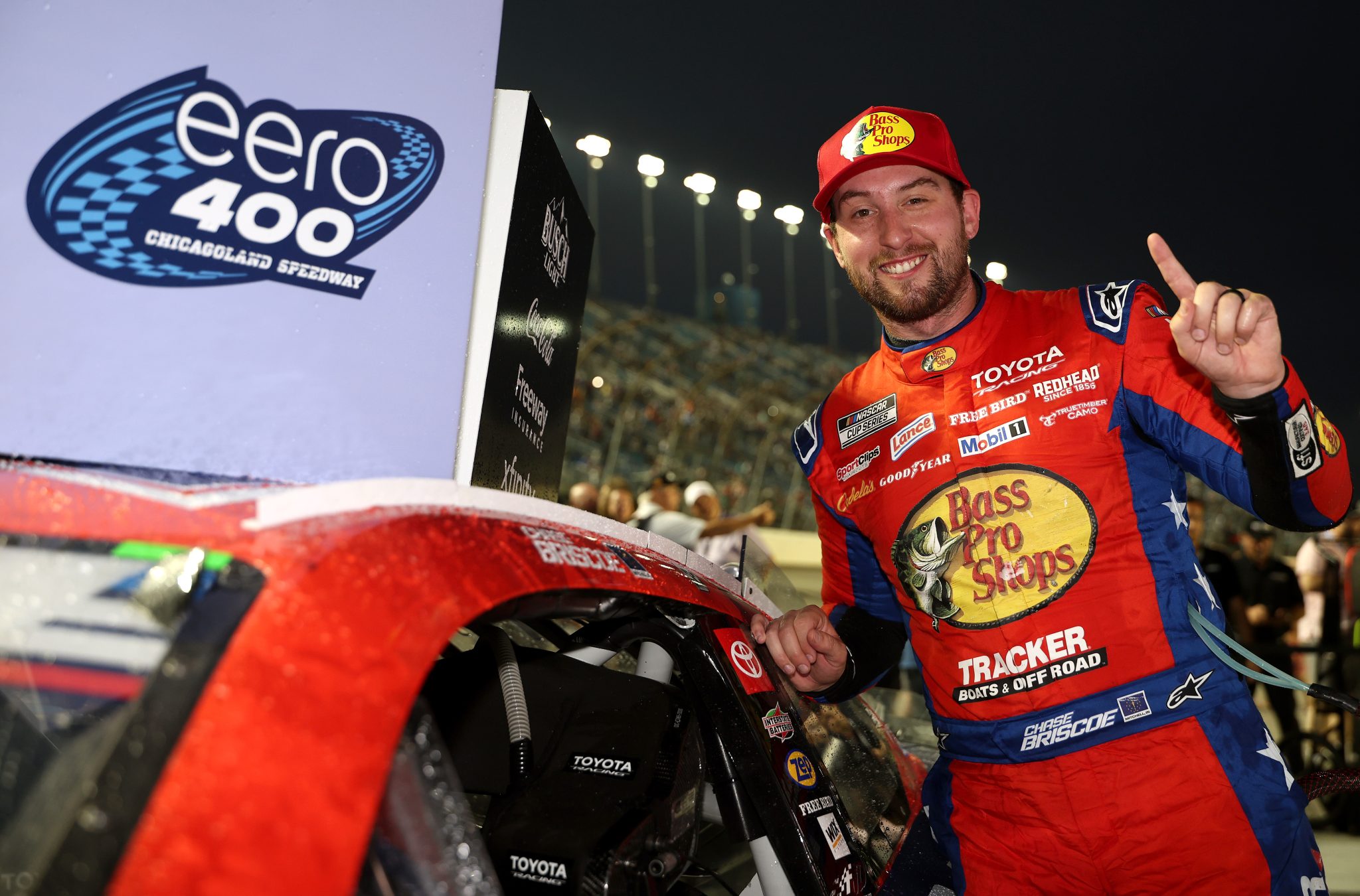 JOLIET, ILLINOIS - JULY 05: Chase Briscoe, driver of the #19 Bass Pro Shops Toyota, poses with the winner sticker on his car in victory lane after winning the NASCAR Cup Series eero 400 at Chicagoland Speedway on July 05, 2026 in Joliet, Illinois. (Photo by James Gilbert/Getty Images) | Getty Images