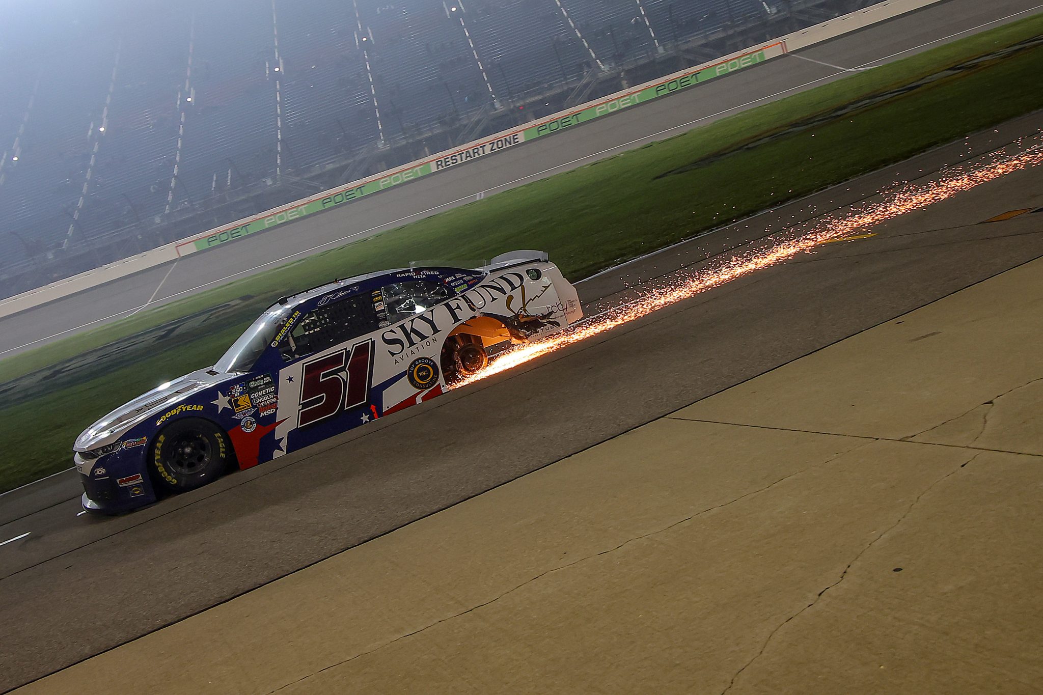 JOLIET, ILLINOIS - JULY 04: Jeremy Clements, driver of the #51 Sky Fund Aviation Chevrolet, drives with a missing rear tire after an on-track incident during the NASCAR O'Reilly Auto Parts Series Cuervo 300 at Chicagoland Speedway on July 04, 2026 in Joliet, Illinois. (Photo by Jonathan Bachman/Getty Images) | Getty Images