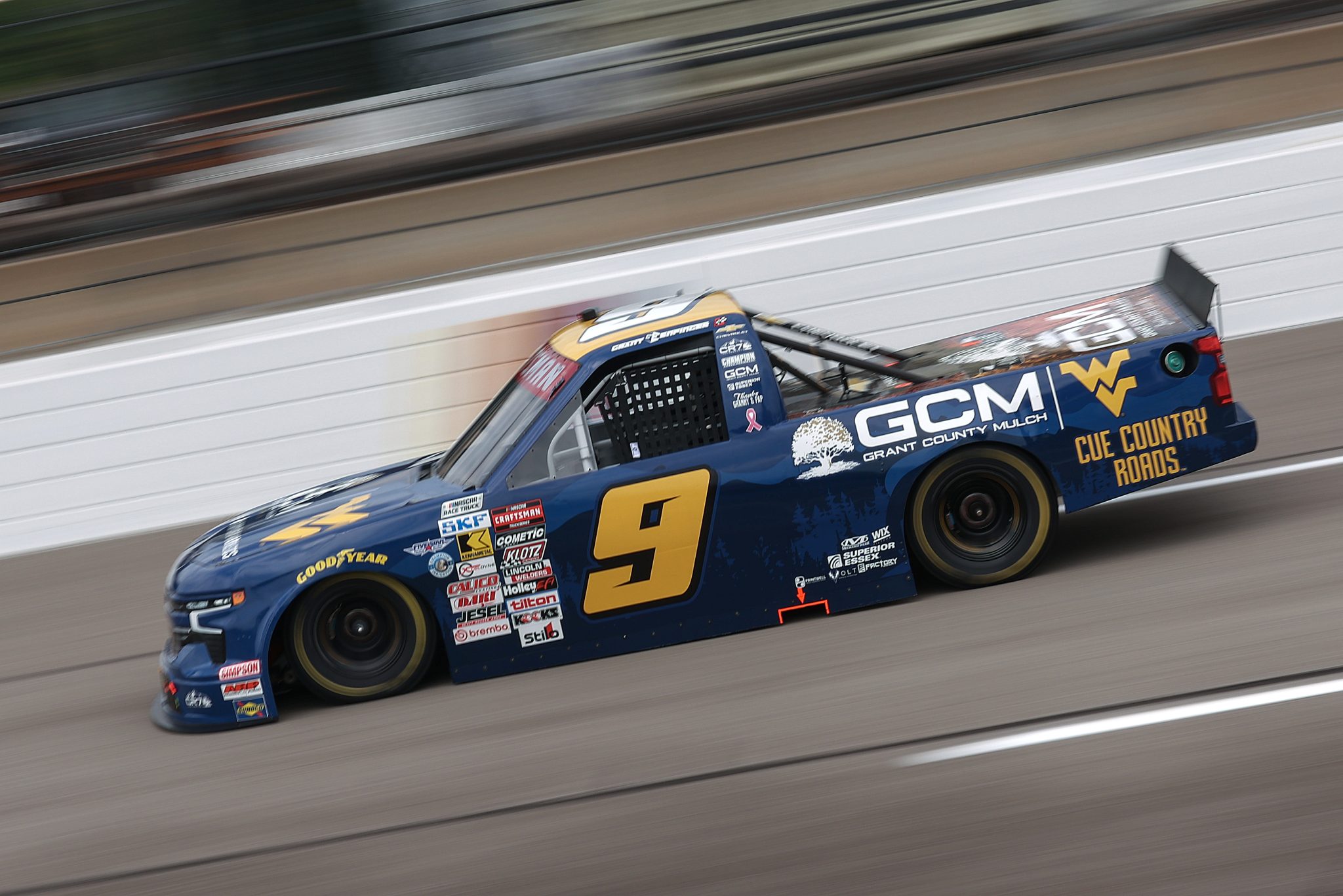 RICHMOND, VIRGINIA - AUGUST 14: Grant Enfinger, driver of the #9 GCM - WVU Athletics Chevrolet, drives during practice for the NASCAR Craftsman Truck Series Black's Tire 250 presented by BTS Rewards at Richmond Raceway on August 14, 2026 in Richmond, Virginia. (Photo by David Jensen/Getty Images) | Getty Images