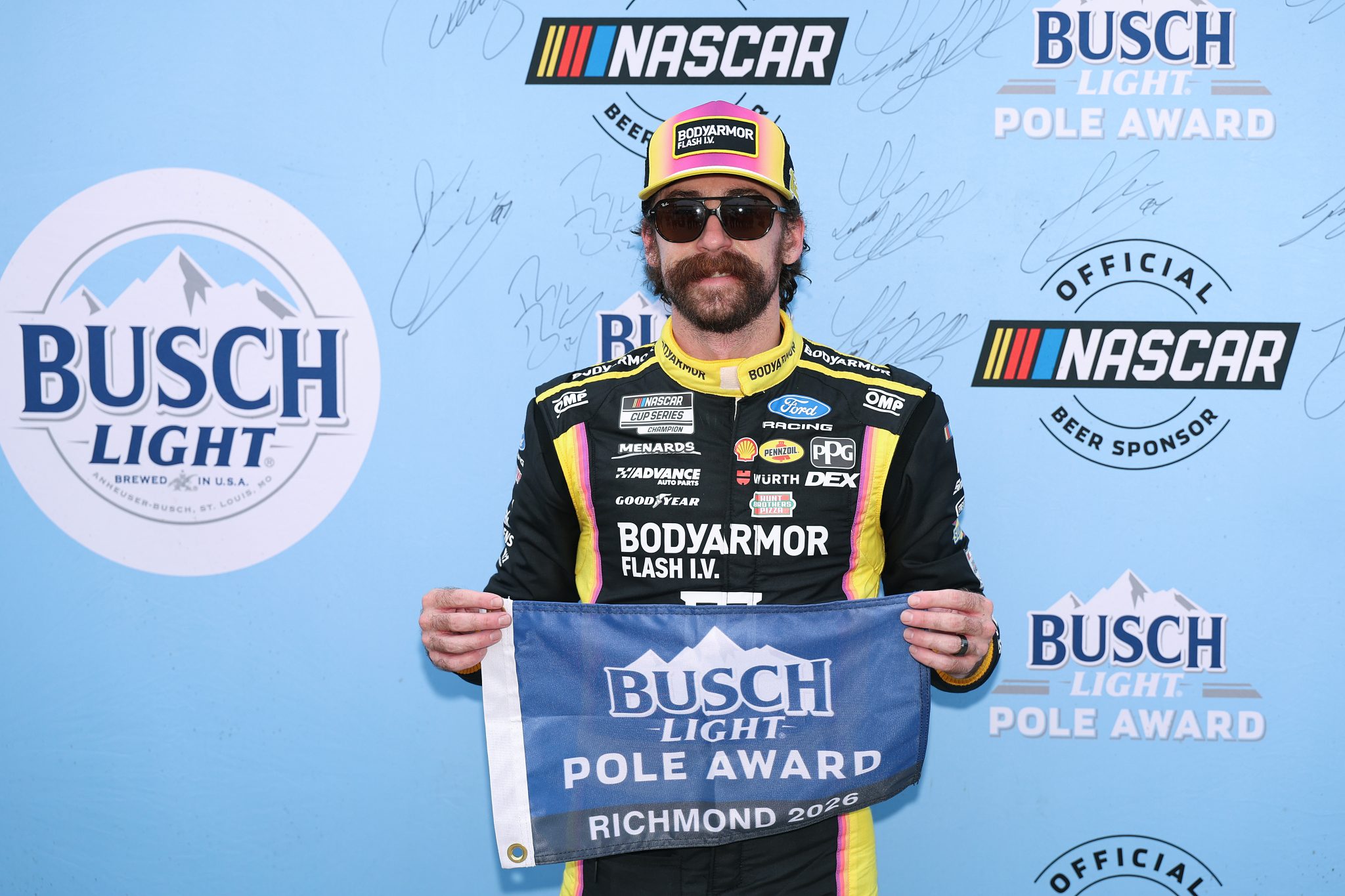 RICHMOND, VIRGINIA - AUGUST 14: Ryan Blaney, driver of the #12 BODYARMOR FLASH I.V. Ford, poses for photos after winning the pole award during qualifying for the NASCAR Cup Series Cook Out 400 at Richmond Raceway on August 14, 2026 in Richmond, Virginia. (Photo by David Jensen/Getty Images) | Getty Images