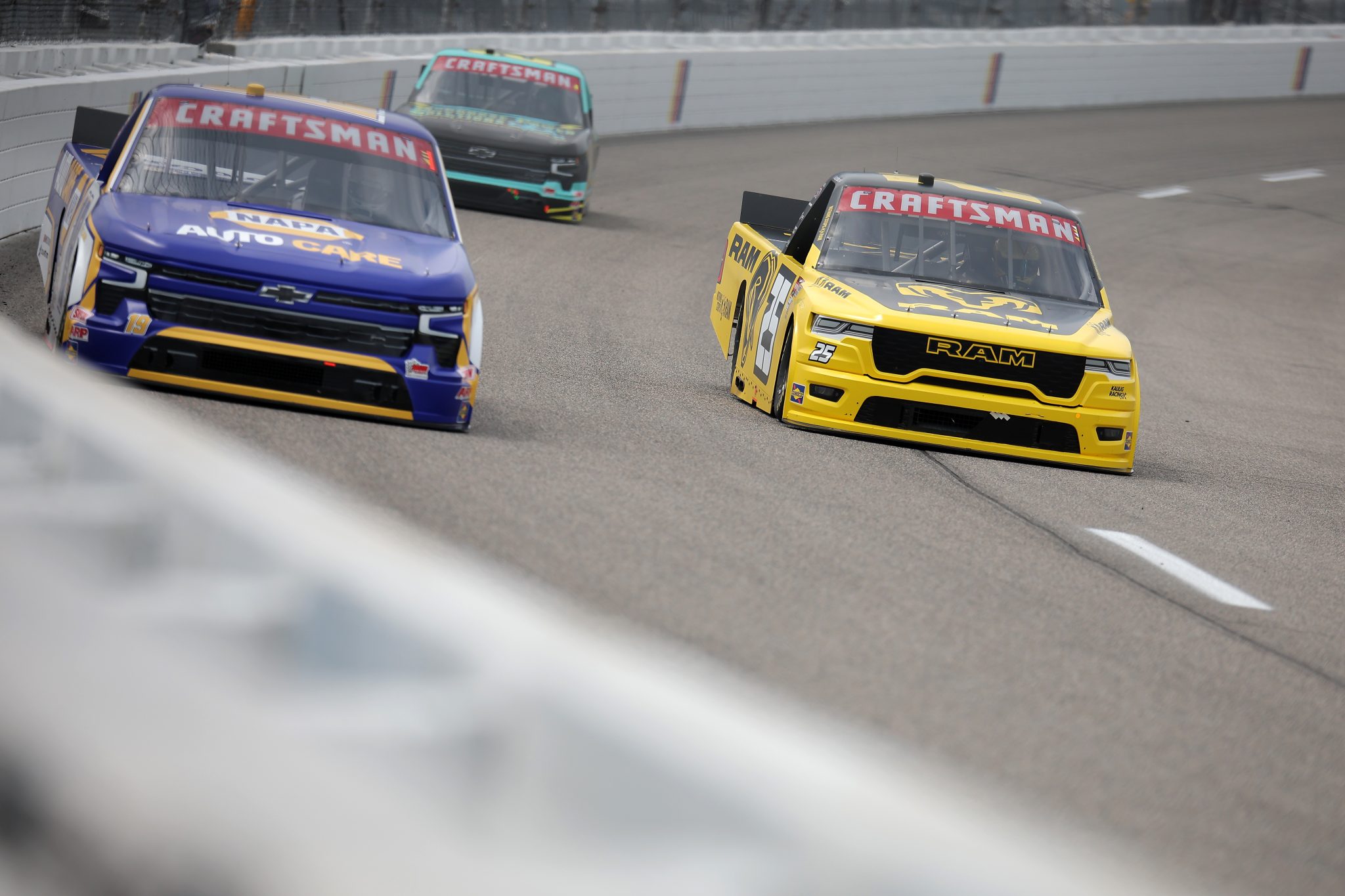 RICHMOND, VIRGINIA - AUGUST 14: Elliott Sadler, driver of the #25 RAM RAM, and Daniel Hemric, driver of the #19 NAPA Auto Care Chevrolet, drive during practice for the NASCAR Craftsman Truck Series Black's Tire 250 presented by BTS Rewards at Richmond Raceway on August 14, 2026 in Richmond, Virginia. (Photo by Jonathan Bachman/Getty Images) | Getty Images