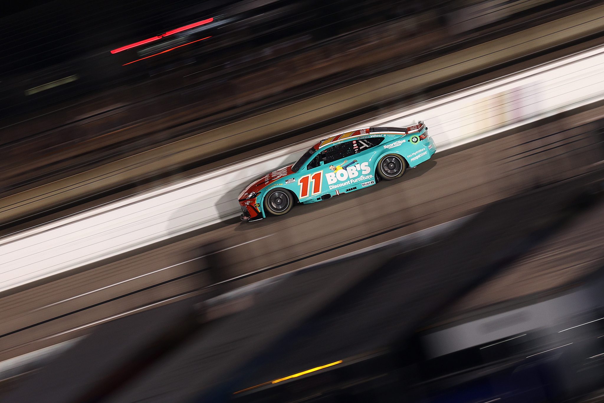 RICHMOND, VIRGINIA - AUGUST 15: Denny Hamlin, driver of the #11 Bob's Discount Furniture Toyota, drives during the NASCAR Cup Series Cook Out 400 at Richmond Raceway on August 15, 2026 in Richmond, Virginia. (Photo by David Jensen/Getty Images) | Getty Images