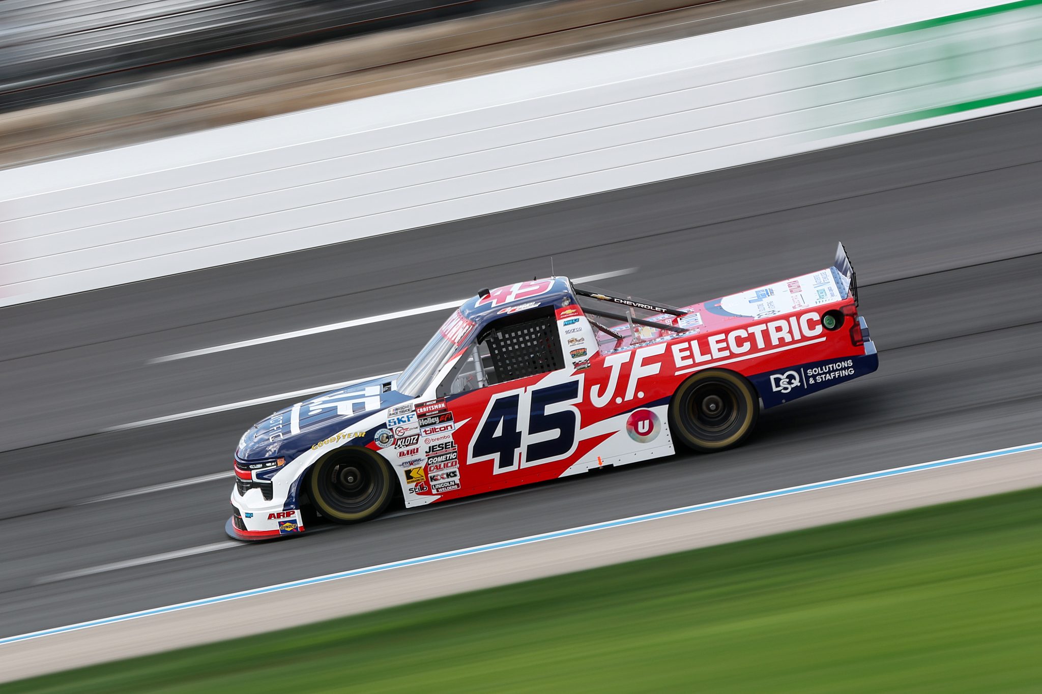 LOUDON, NEW HAMPSHIRE - AUGUST 21: Landen Lewis, driver of the #45 J.F. Electric/Utilitra Chevrolet, drives during practice for the NASCAR Craftsman Truck Series Team EJP 175 at New Hampshire Motor Speedway on August 21, 2026 in Loudon, New Hampshire. (Photo by Meg Oliphant/Getty Images) | Getty Images