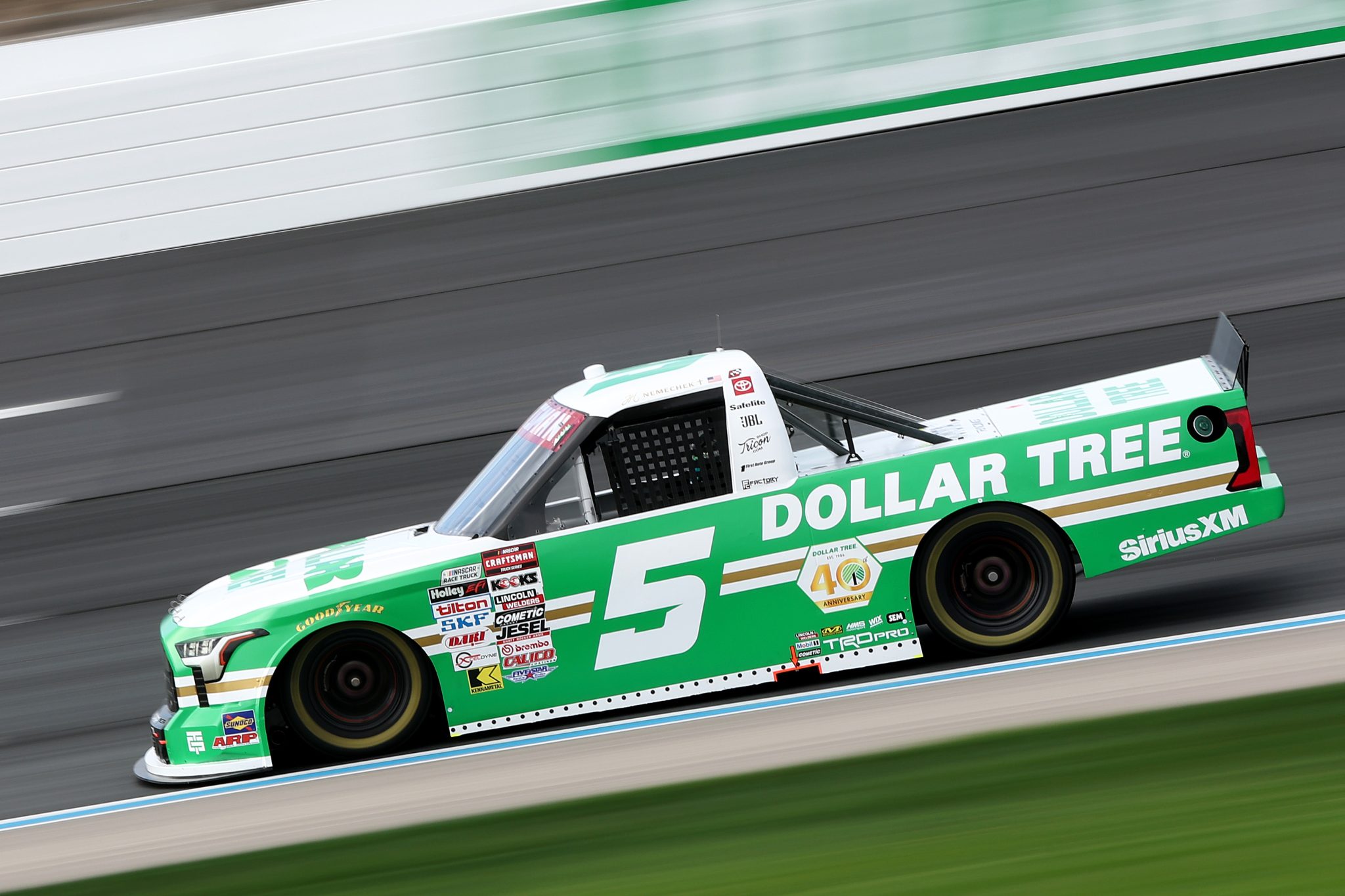 LOUDON, NEW HAMPSHIRE - AUGUST 21: John Hunter Nemechek, driver of the #5 Dollar Tree Toyota, drives during practice for the NASCAR Craftsman Truck Series Team EJP 175 at New Hampshire Motor Speedway on August 21, 2026 in Loudon, New Hampshire. (Photo by Meg Oliphant/Getty Images) | Getty Images