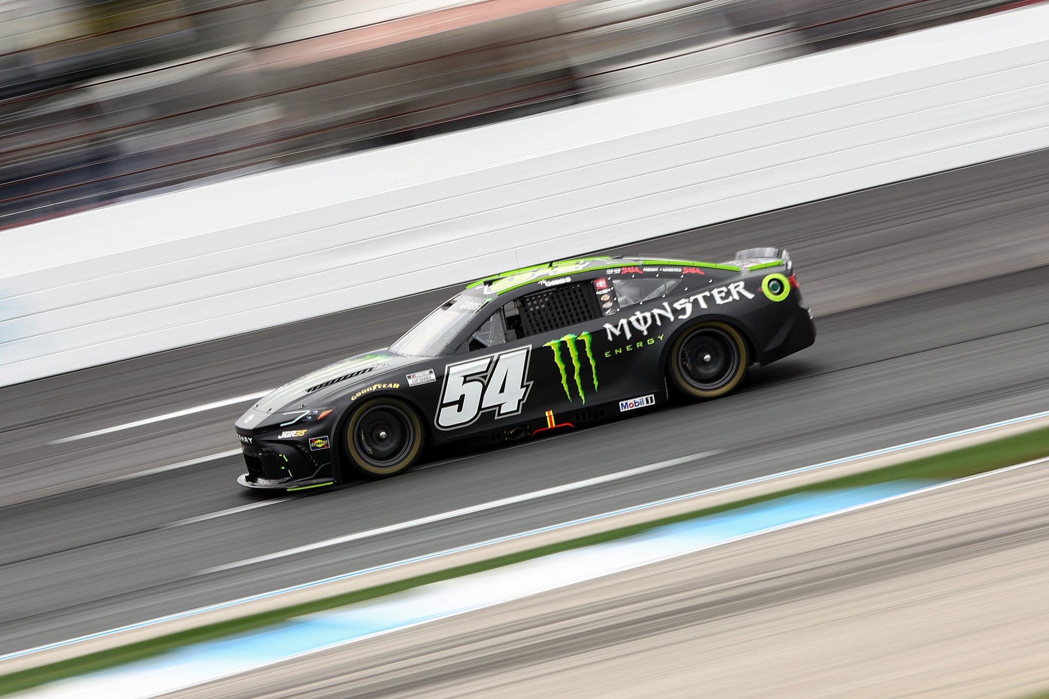 LOUDON, NEW HAMPSHIRE - AUGUST 22: Ty Gibbs, driver of the #54 Monster Energy Toyota, drives during practice for the NASCAR Cup Series Dollar Tree 301at New Hampshire Motor Speedway on August 22, 2026 in Loudon, New Hampshire. (Photo by Meg Oliphant/Getty Images) | Getty Images