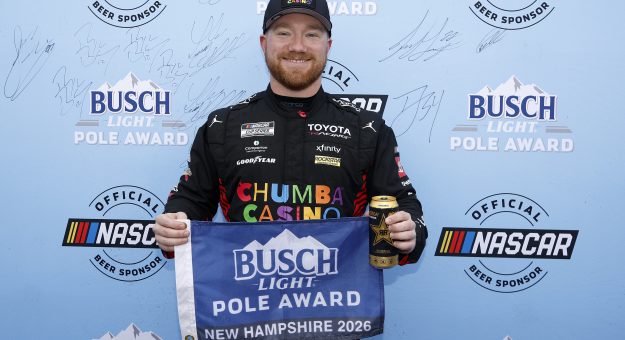 LOUDON, NEW HAMPSHIRE - AUGUST 22: Tyler Reddick, driver of the #45 Chumba Casino Toyota, poses for photos after winning the pole award during qualifying for the NASCAR Cup Series Dollar Tree 301at New Hampshire Motor Speedway on August 22, 2026 in Loudon, New Hampshire. (Photo by Sean Gardner/Getty Images) | Getty Images