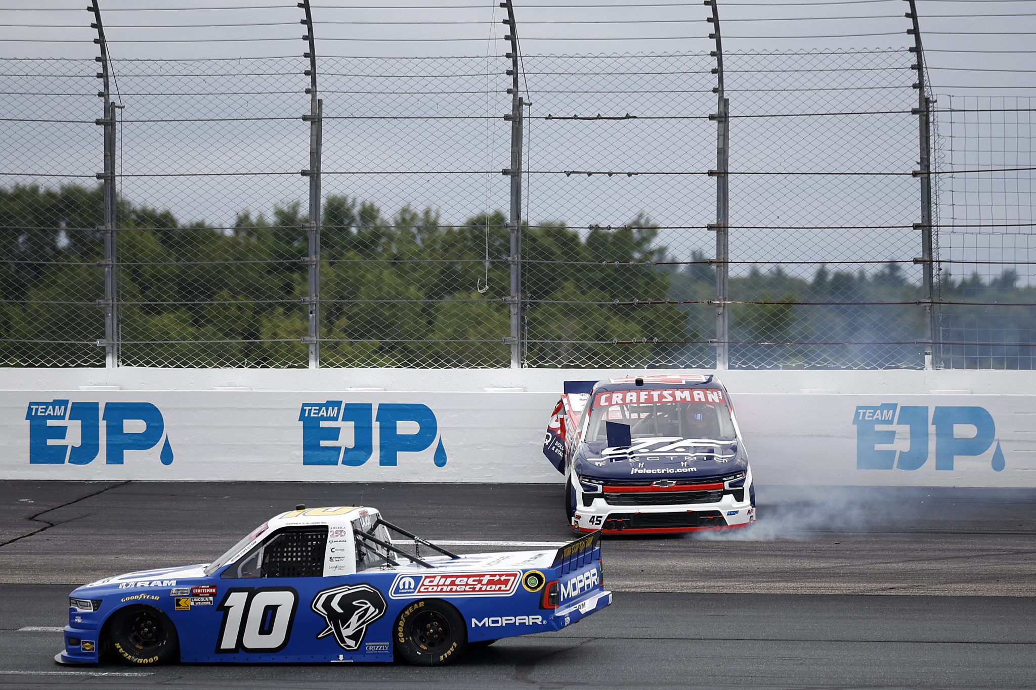 LOUDON, NEW HAMPSHIRE - AUGUST 22: Landen Lewis, driver of the #45 J.F. Electric/Utilitra Chevrolet, spins after an on-track incident during the NASCAR Craftsman Truck Series Team EJP 175 at New Hampshire Motor Speedway on August 22, 2026 in Loudon, New Hampshire. (Photo by Sean Gardner/Getty Images) | Getty Images