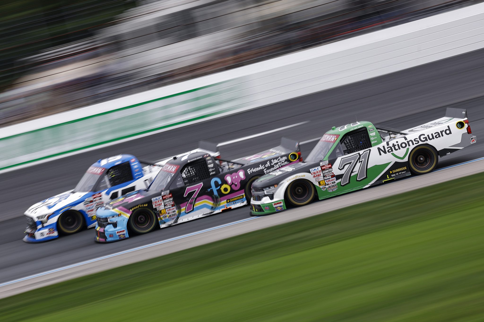 LOUDON, NEW HAMPSHIRE - AUGUST 22: Connor Zilisch, driver of the #71 NationsGuard Chevrolet, Connor Mosack, driver of the #7 Friends of Jaclyn Foundation Chevrolet, and Tanner Gray, driver of the #15 Place of Hope Toyota, e during the NASCAR Craftsman Truck Series Team EJP 175 at New Hampshire Motor Speedway on August 22, 2026 in Loudon, New Hampshire. (Photo by Sean Gardner/Getty Images) | Getty Images