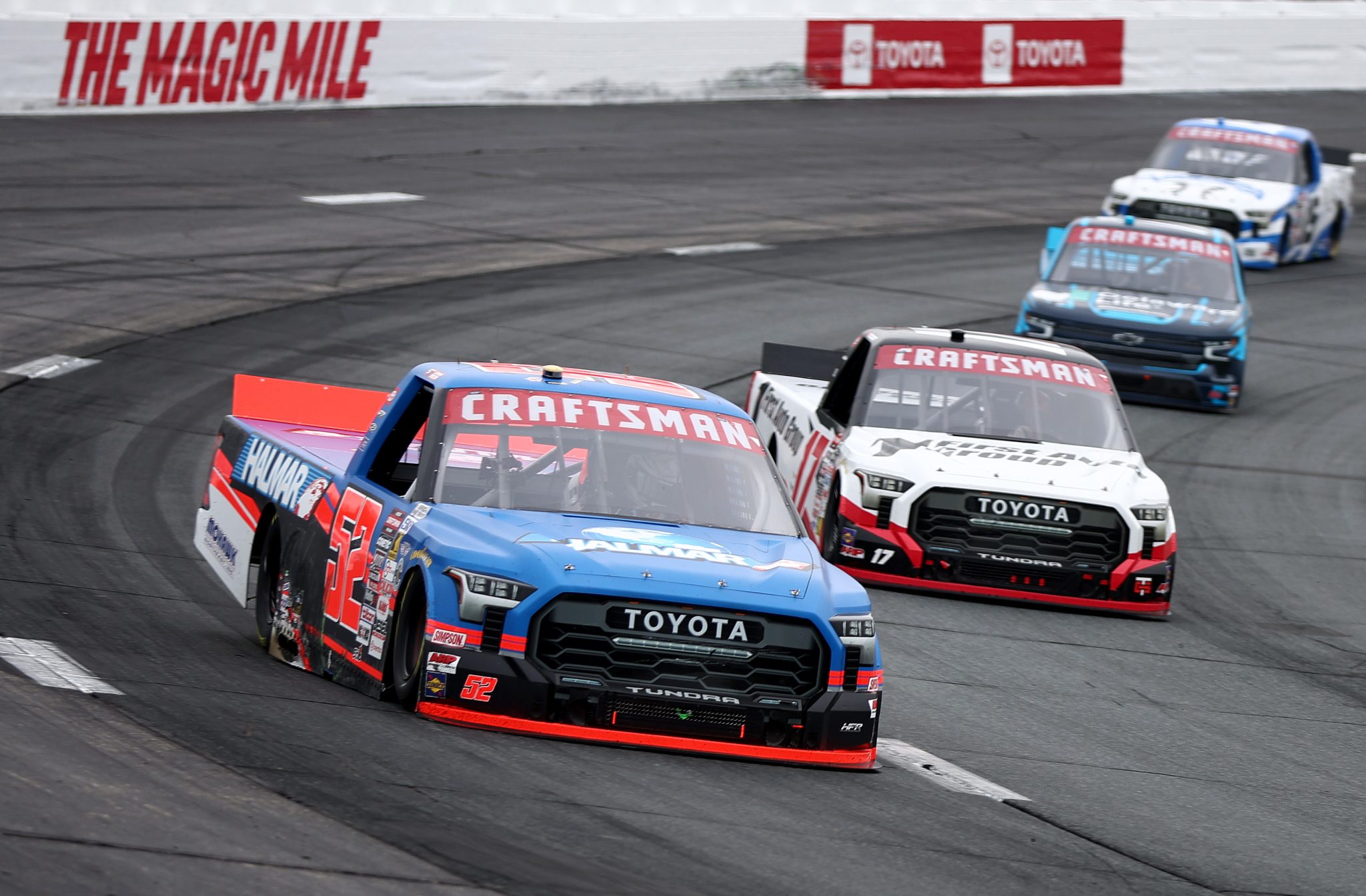 LOUDON, NEW HAMPSHIRE - AUGUST 22: Stewart Friesen, driver of the #52 Halmar International Toyota, and Giovanni Ruggiero, driver of the #17 First Auto Group Toyota, race during the NASCAR Craftsman Truck Series Team EJP 175 at New Hampshire Motor Speedway on August 22, 2026 in Loudon, New Hampshire. (Photo by Meg Oliphant/Getty Images) | Getty Images