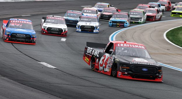 LOUDON, NEW HAMPSHIRE - AUGUST 22: Layne Riggs, driver of the #34 BKB Bare Knuckle Boxing Ford, leads the field during the NASCAR Craftsman Truck Series Team EJP 175 at New Hampshire Motor Speedway on August 22, 2026 in Loudon, New Hampshire. (Photo by Meg Oliphant/Getty Images) | Getty Images