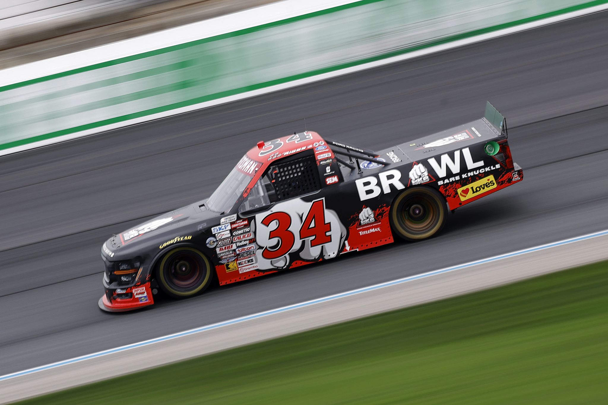 LOUDON, NEW HAMPSHIRE - AUGUST 22: Layne Riggs, driver of the #34 BKB Bare Knuckle Boxing Ford, drives during the NASCAR Craftsman Truck Series Team EJP 175 at New Hampshire Motor Speedway on August 22, 2026 in Loudon, New Hampshire. (Photo by Sean Gardner/Getty Images) | Getty Images