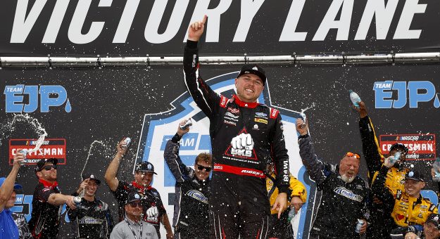 LOUDON, NEW HAMPSHIRE - AUGUST 22: Layne Riggs, driver of the #34 BKB Bare Knuckle Boxing Ford, celebrates in victory lane after winning the NASCAR Craftsman Truck Series Team EJP 175 at New Hampshire Motor Speedway on August 22, 2026 in Loudon, New Hampshire. (Photo by Sean Gardner/Getty Images) | Getty Images