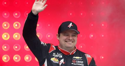 LOUDON, NEW HAMPSHIRE - AUGUST 23: Cole Custer, driver of the #41 HaasTooling.com Chevrolet, waves to fans as he walks onstage during driver intros prior to the NASCAR Cup Series Dollar Tree 301 at New Hampshire Motor Speedway on August 23, 2026 in Loudon, New Hampshire. (Photo by Sean Gardner/Getty Images) | Getty Images