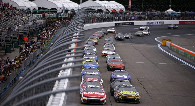 LOUDON, NEW HAMPSHIRE - AUGUST 23: William Byron, driver of the #24 Raptor Chevrolet, and Shane Van Gisbergen, driver of the #97 Superfile Chevrolet, lead the field during the NASCAR Cup Series Dollar Tree 301 at New Hampshire Motor Speedway on August 23, 2026 in Loudon, New Hampshire. (Photo by Sean Gardner/Getty Images) | Getty Images