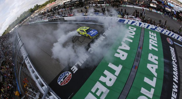 LOUDON, NEW HAMPSHIRE - AUGUST 23: Ryan Blaney, driver of the #12 Menards/Dutch Boy Ford, celebrates with a burnout after winning the NASCAR Cup Series Dollar Tree 301 at New Hampshire Motor Speedway on August 23, 2026 in Loudon, New Hampshire. (Photo by Sean Gardner/Getty Images) | Getty Images