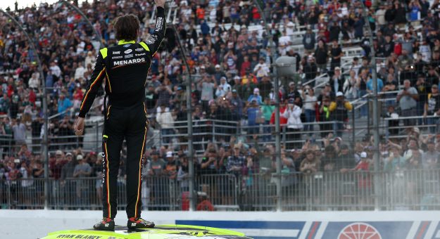 LOUDON, NEW HAMPSHIRE - AUGUST 23: Ryan Blaney, driver of the #12 Menards/Dutch Boy Ford, gives a thumbs up to fans after winning the NASCAR Cup Series Dollar Tree 301 at New Hampshire Motor Speedway on August 23, 2026 in Loudon, New Hampshire. (Photo by Meg Oliphant/Getty Images) | Getty Images