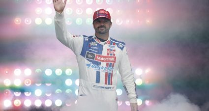 LOUDON, NEW HAMPSHIRE - AUGUST 23: Josh Berry, driver of the #21 Motorcraft/Quick Lane Ford, waves to fans as he walks onstage during driver intros prior to the NASCAR Cup Series Dollar Tree 301 at New Hampshire Motor Speedway on August 23, 2026 in Loudon, New Hampshire. (Photo by Sean Gardner/Getty Images) | Getty Images