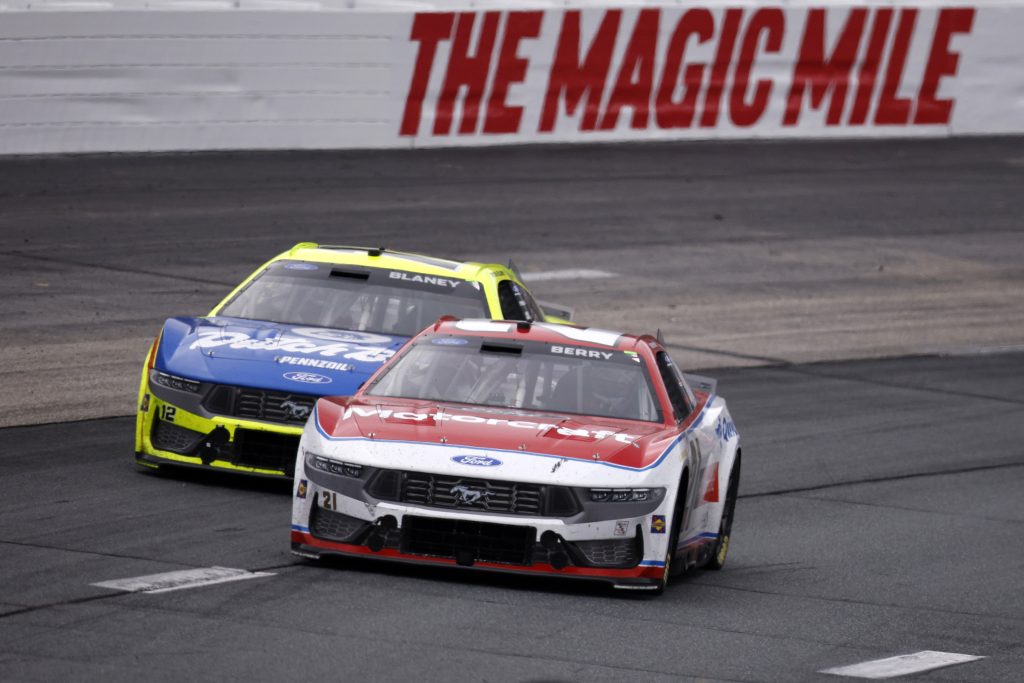 LOUDON, NEW HAMPSHIRE - AUGUST 23: Josh Berry, driver of the #21 Motorcraft/Quick Lane Ford, and Ryan Blaney, driver of the #12 Menards/Dutch Boy Ford, race during the NASCAR Cup Series Dollar Tree 301 at New Hampshire Motor Speedway on August 23, 2026 in Loudon, New Hampshire. (Photo by Sean Gardner/Getty Images) | Getty Images