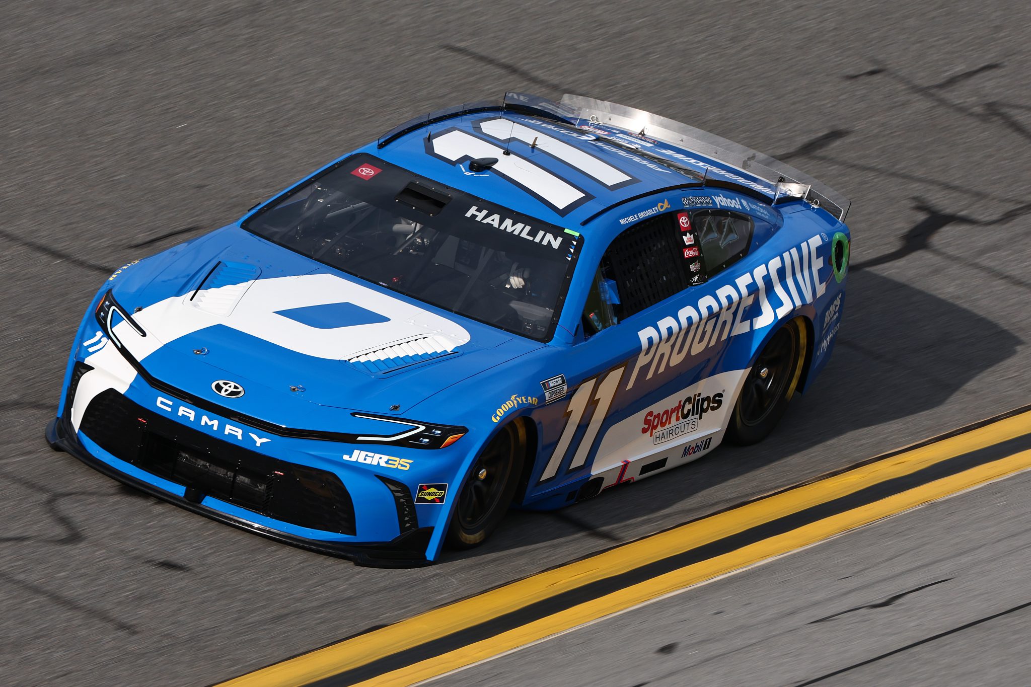 DAYTONA BEACH, FLORIDA - AUGUST 28: Denny Hamlin, driver of the #11 Progressive Insurance Toyota, drives during qualifying for the NASCAR Cup Series Coke Zero Sugar 400 at Daytona International Speedway on August 28, 2026 in Daytona Beach, Florida. (Photo by Chris Graythen/Getty Images) | Getty Images