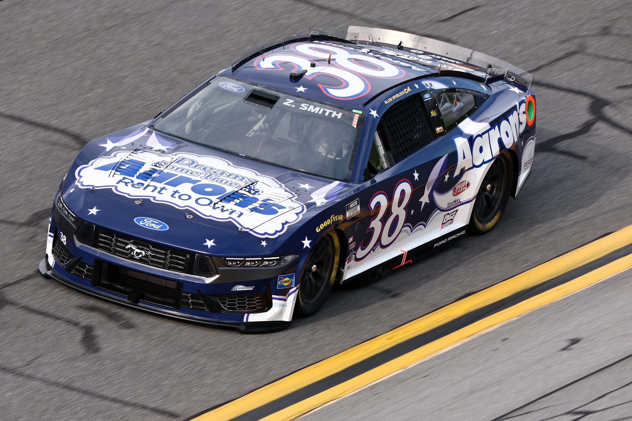 DAYTONA BEACH, FLORIDA - AUGUST 28: Zane Smith, driver of the #38 Aaron's Dream Machine Ford, drives during qualifying for the NASCAR Cup Series Coke Zero Sugar 400 at Daytona International Speedway on August 28, 2026 in Daytona Beach, Florida. (Photo by Chris Graythen/Getty Images) | Getty Images