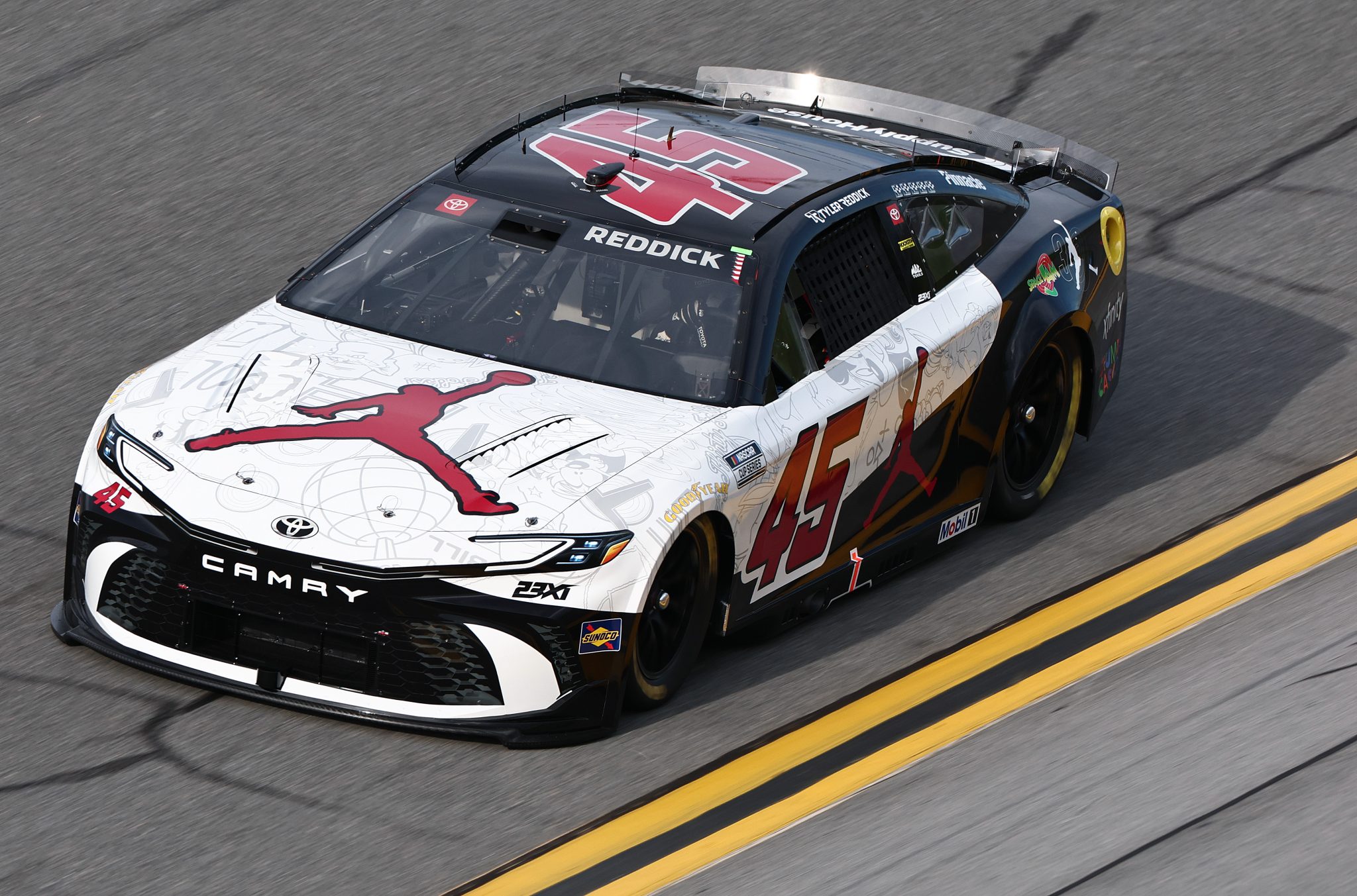 DAYTONA BEACH, FLORIDA - AUGUST 28: Tyler Reddick, driver of the #45 Jordan Brand Toyota, drives during qualifying for the NASCAR Cup Series Coke Zero Sugar 400 at Daytona International Speedway on August 28, 2026 in Daytona Beach, Florida. (Photo by Chris Graythen/Getty Images) | Getty Images