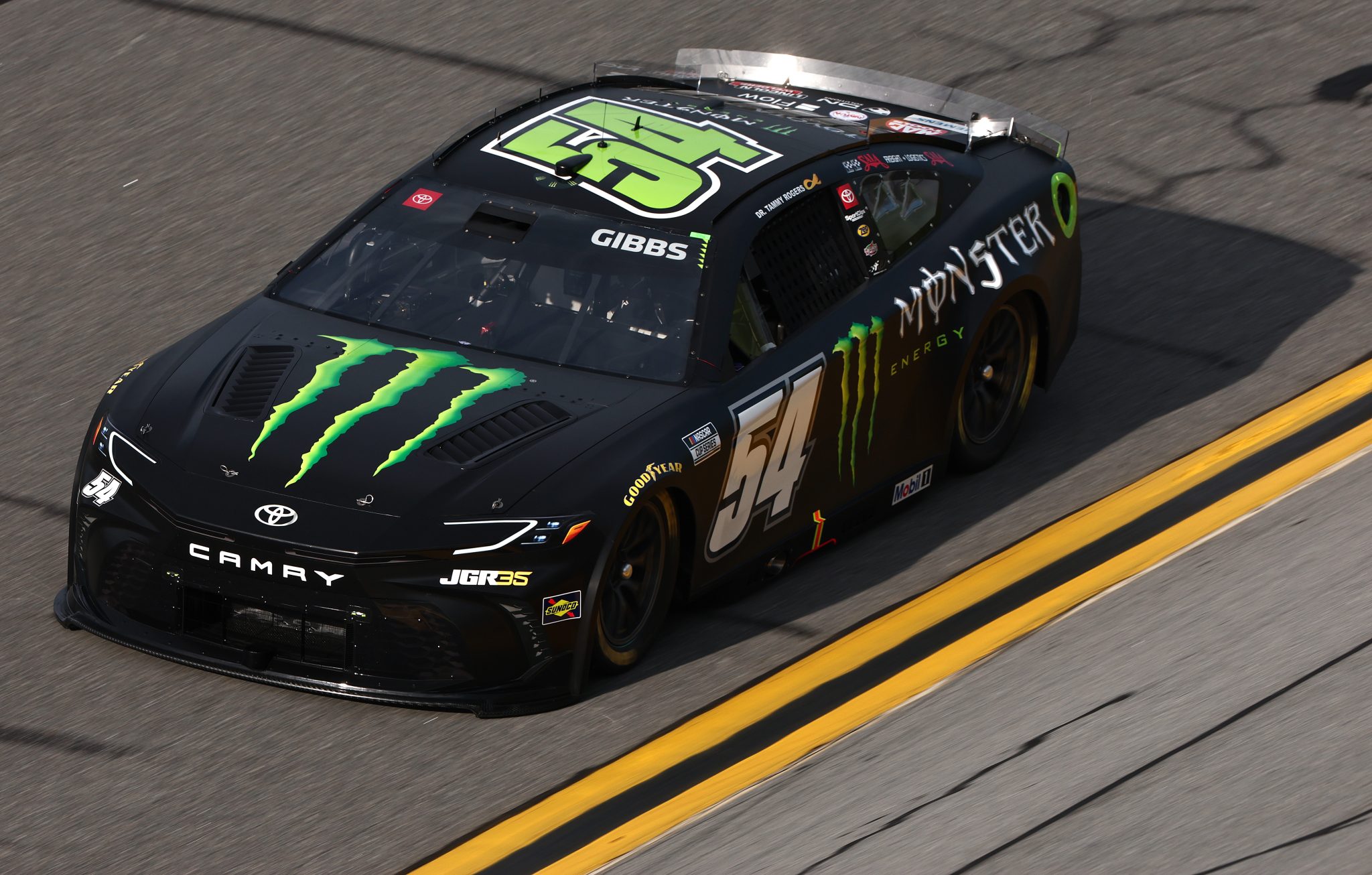 DAYTONA BEACH, FLORIDA - AUGUST 28: Ty Gibbs, driver of the #54 Monster Energy Toyota, drives during qualifying for the NASCAR Cup Series Coke Zero Sugar 400 at Daytona International Speedway on August 28, 2026 in Daytona Beach, Florida. (Photo by Chris Graythen/Getty Images) | Getty Images