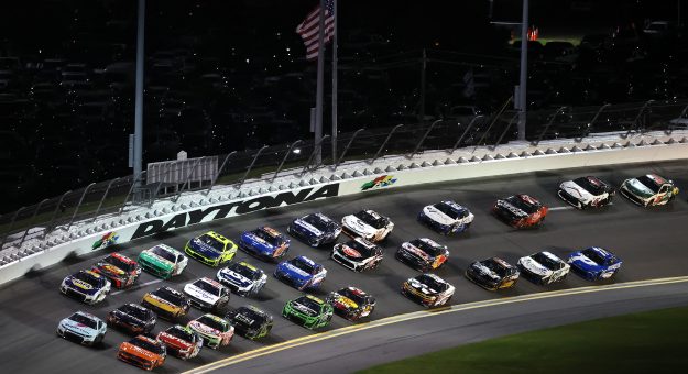 DAYTONA BEACH, FLORIDA - AUGUST 29: Brad Keselowski, driver of the #6 Consumer Cellular Ford, and Cody Ware, driver of the #51 Super.com Chevrolet, lead the field during the NASCAR Cup Series Coke Zero Sugar 400 at Daytona International Speedway on August 29, 2026 in Daytona Beach, Florida. (Photo by James Gilbert/Getty Images) | Getty Images