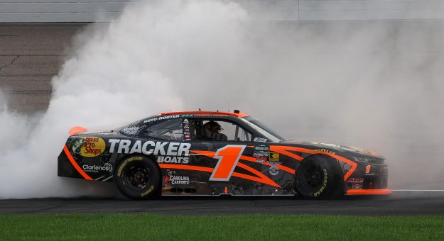 NEWTON, IOWA - AUGUST 08: Carson Kvapil, driver of the #1 Bass Pro Shops Chevrolet, celebrates with a burnout after winning the NASCAR O'Reilly Auto Parts Series HyVee Perks 250 at Iowa Speedway on August 08, 2026 in Newton, Iowa. (Photo by Chris Graythen/Getty Images) | Getty Images