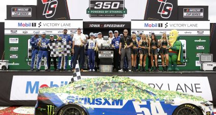 NEWTON, IOWA - AUGUST 09: Ty Gibbs, driver of the #54 SiriusXM Toyota, and crew celebrate in victory lane after winning the NASCAR Cup Series Iowa Corn 350 Powered by Ethanol at Iowa Speedway on August 09, 2026 in Newton, Iowa. (Photo by Sean Gardner/Getty Images) | Getty Images