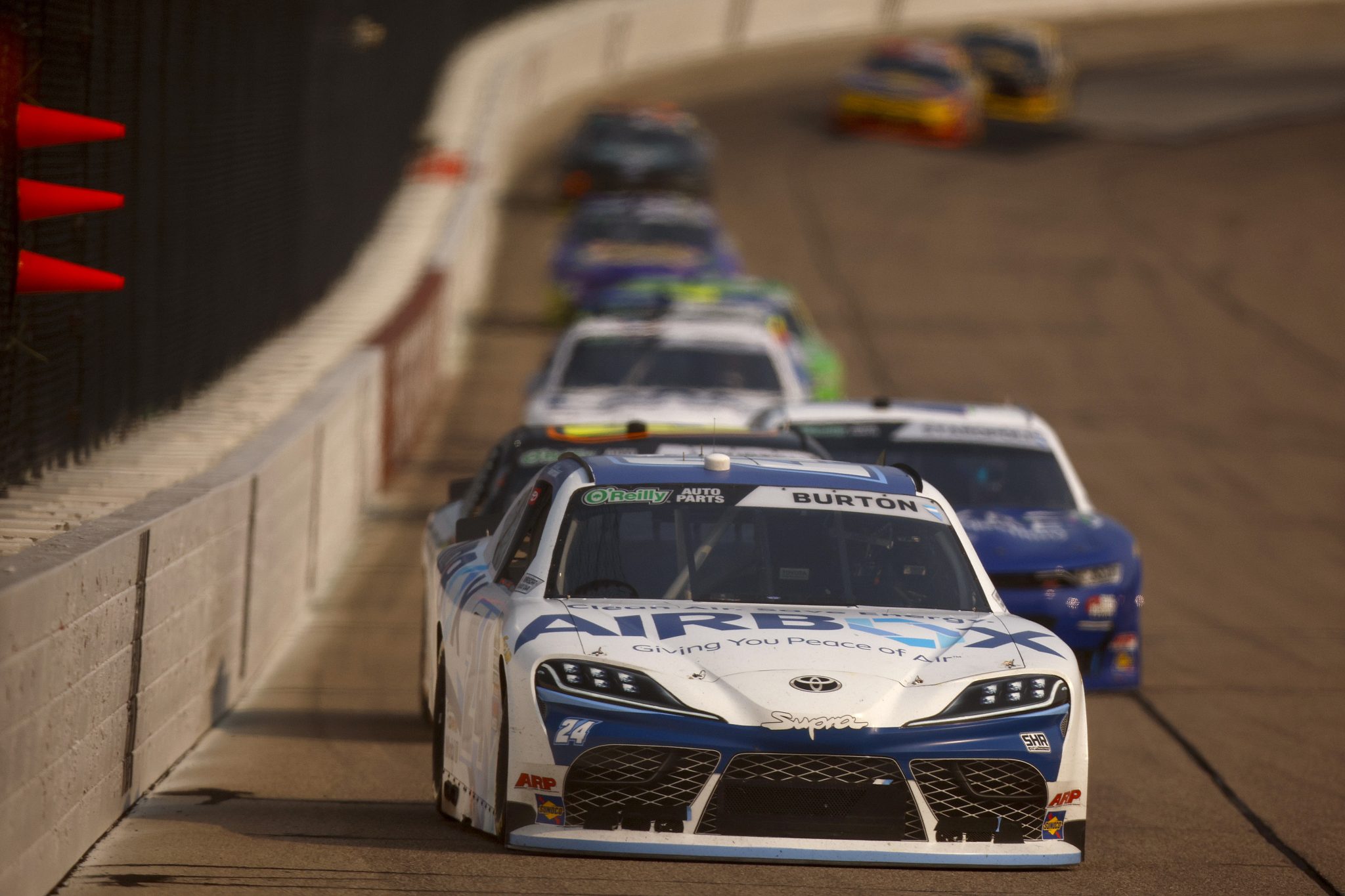 NEWTON, IOWA - AUGUST 08: Harrison Burton, driver of the #24 AIRBOX Toyota, drives during the NASCAR O'Reilly Auto Parts Series HyVee Perks 250 at Iowa Speedway on August 08, 2026 in Newton, Iowa. (Photo by Sean Gardner/Getty Images) | Getty Images