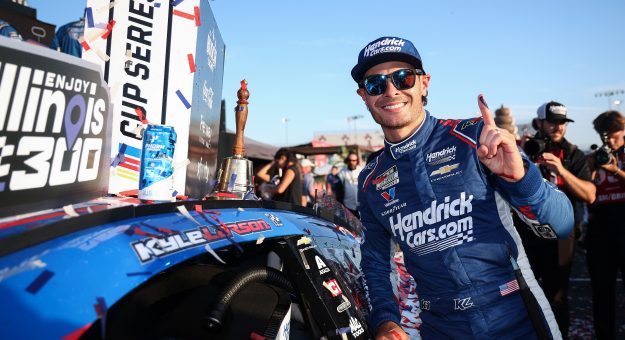 MADISON, ILLINOIS - SEPTEMBER 13: Kyle Larson, driver of the #5 HendrickCars.com Chevrolet, poses with the winner sticker on his car in victory lane after winning the NASCAR Cup Series Enjoy Illinois 300 at WWT Raceway on September 13, 2026 in Madison, Illinois. (Photo by Chris Graythen/Getty Images) | Getty Images