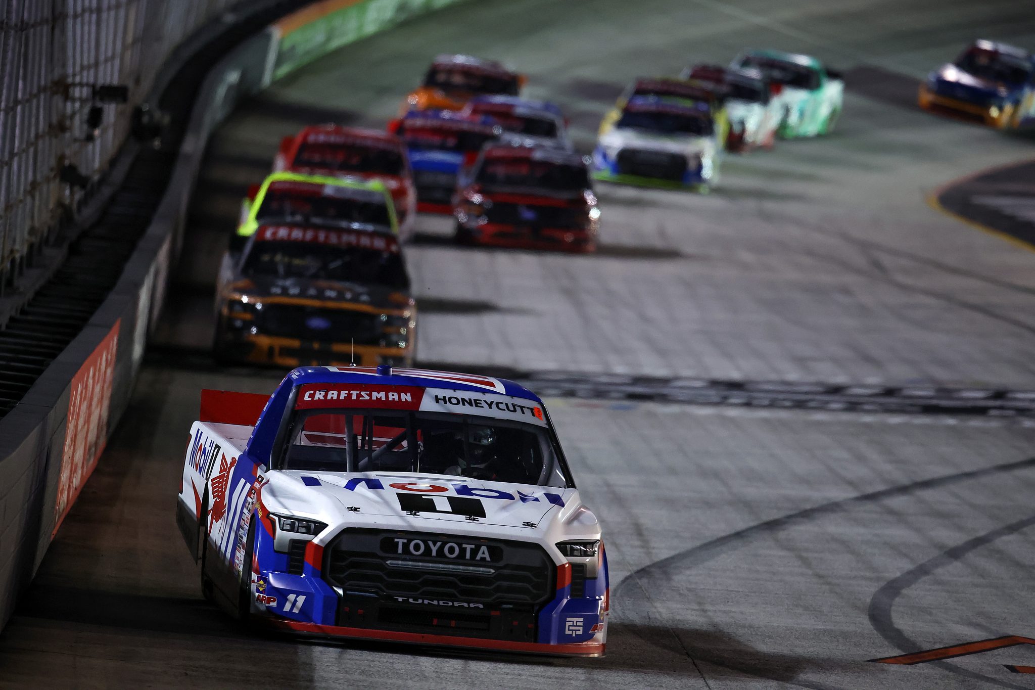 BRISTOL, TENNESSEE - SEPTEMBER 17: Kaden Honeycutt, driver of the #11 Mobil 1 Toyota, drives during the NASCAR Craftsman Truck Series UNOH 250 Presented by Ohio Logistics at Bristol Motor Speedway on September 17, 2026 in Bristol, Tennessee. (Photo by Jonathan Bachman/Getty Images) | Getty Images